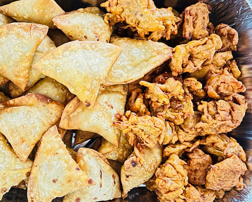 Freshly fried vegetable samosas for Indian party catering in Brampton.