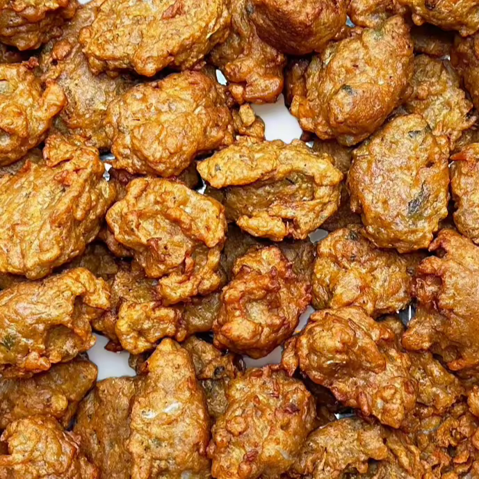 Freshly fried vegetable Pakoras for Indian party catering in Brampton.