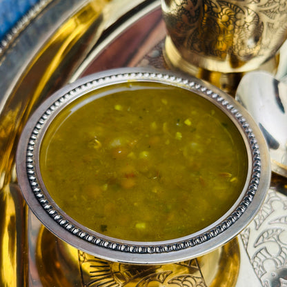 Authentic Indian catering large food tray featuring traditional dal.