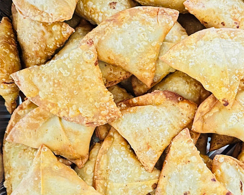 Freshly fried vegetable samosas for Indian party catering in Brampton.
