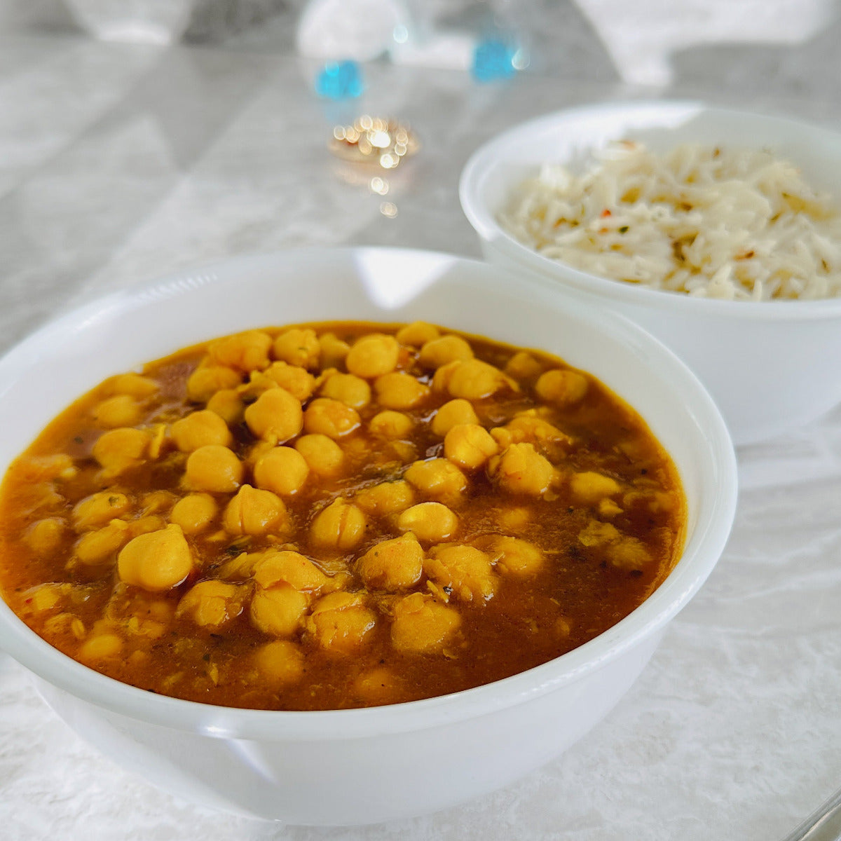 Royal Ruby Chole Bhatura party tray – rich spiced chickpea curry served with fluffy fried bhatura bread, perfect for gatherings