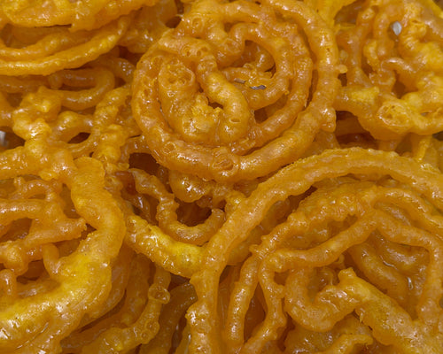 Royal Ruby Jalebi – crispy golden orange swirls soaked in sugar syrup, a popular traditional Indian sweet, 1LB serving