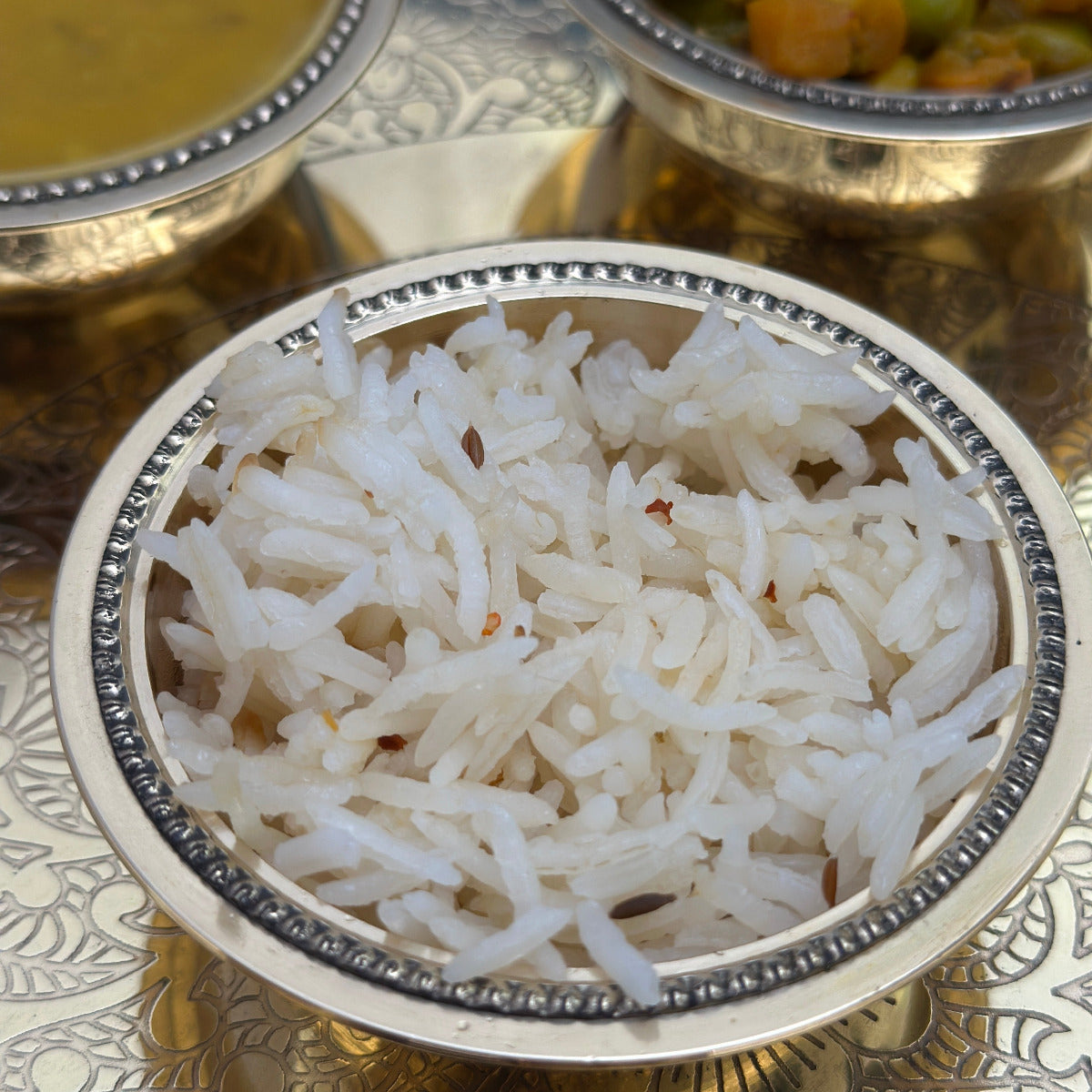 Authentic Indian side dish featuring Plain, Jeera, or Peas rice.