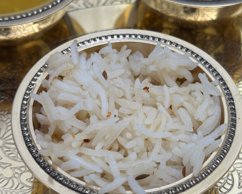 Authentic Indian side dish featuring Plain, Jeera, or Peas rice.