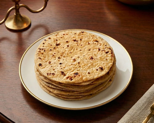 Freshly prepared handmade whole wheat roti, soft and golden-brown, served hot from our certified commercial kitchen in Newmarket. Where to buy bulk roti near me